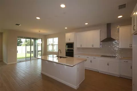 Kitchen - 6753 Yellow Warbler Bnd, Saint Cloud, FL 34773 photo 1 of 2