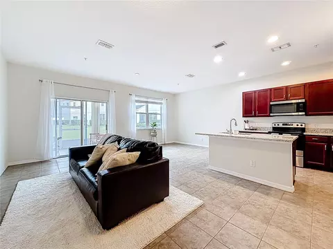 Living - 661 Fortanini Cir, Ocoee, FL 34761 photo 7 of 7