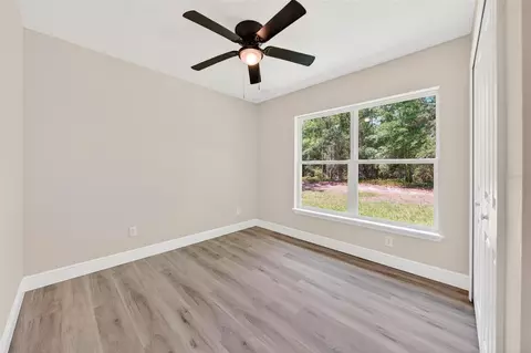 Bedroom - 2132 Pine Meadows Golf Course Rd, Eustis, FL 32726 photo 3 of 11