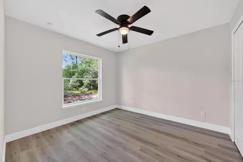 Bedroom - 2132 Pine Meadows Golf Course Rd, Eustis, FL 32726 photo 9 of 11