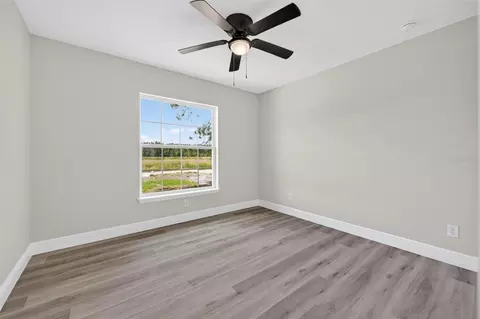 Bedroom - 2132 Pine Meadows Golf Course Rd, Eustis, FL 32726 photo 6 of 11