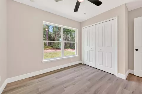 Bedroom - 2132 Pine Meadows Golf Course Rd, Eustis, FL 32726 photo 4 of 11
