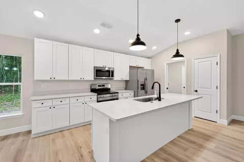 Kitchen - 2132 Pine Meadows Golf Course Rd, Eustis, FL 32726 photo 3 of 7
