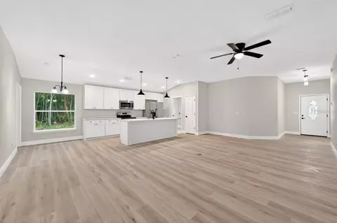 Living - 2132 Pine Meadows Golf Course Rd, Eustis, FL 32726 photo 4 of 6