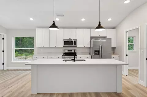Kitchen - 2132 Pine Meadows Golf Course Rd, Eustis, FL 32726 photo 2 of 7