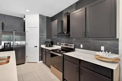 Kitchen - 1631 Groveline Rd, Saint Cloud, FL 34771 photo 9 of 16