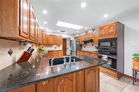 Kitchen - 6770 Bay Shore Dr, Saint Cloud, FL 34771 photo 2 of 8
