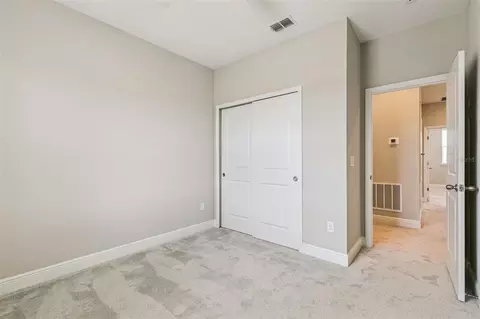Bedroom - 6491 Cyrils Dr, Saint Cloud, FL 34771 photo 4 of 9