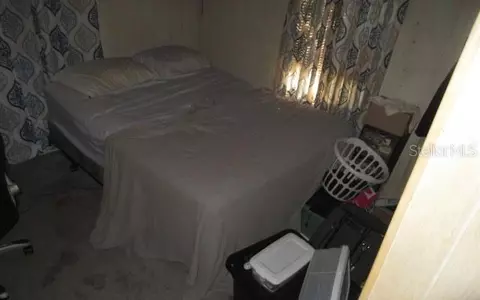 Bedroom - 814 NW 2nd St, Ocala, FL 34475 photo 2 of 2