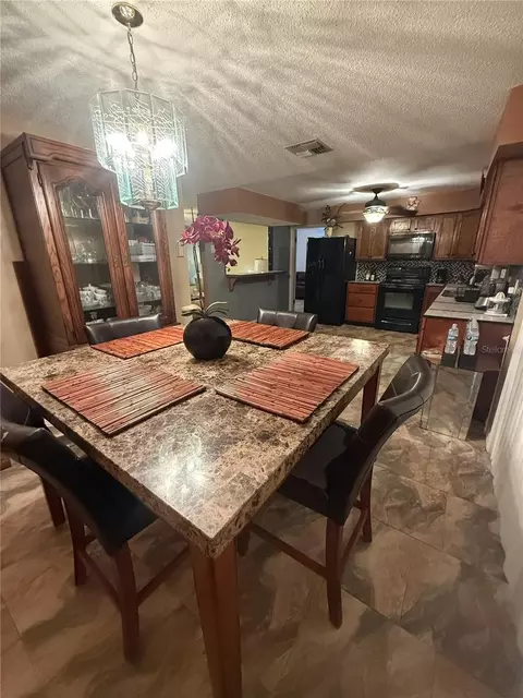 Dining - 3607 Briarcliff Way, Mims, FL 32754 photo 2 of 3