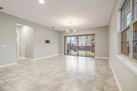 Living - 5234 Buttonsage Dr, Saint Cloud, FL 34772 photo 5 of 9