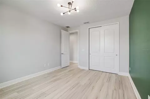Bedroom - 5234 Buttonsage Dr, Saint Cloud, FL 34772 photo 9 of 11