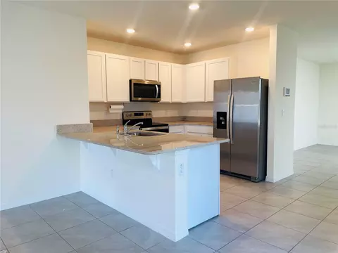 Kitchen - 17043 Oval Rum Dr, Wimauma, FL 33598 photo 1 of 6