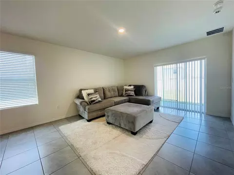 Living - 17043 Oval Rum Dr, Wimauma, FL 33598 photo 1 of 2