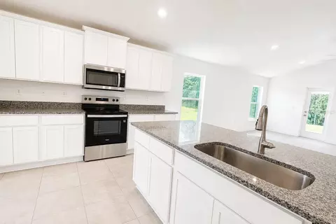 Kitchen - 7606 Bent Tree Loop, Saint Cloud, FL 34773 photo 2 of 4