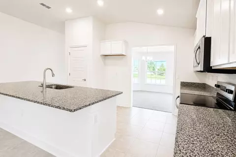 Kitchen - 7606 Bent Tree Loop, Saint Cloud, FL 34773 photo 4 of 4