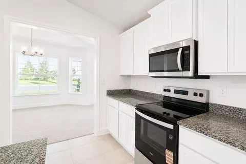 Kitchen - 7606 Bent Tree Loop, Saint Cloud, FL 34773 photo 3 of 4