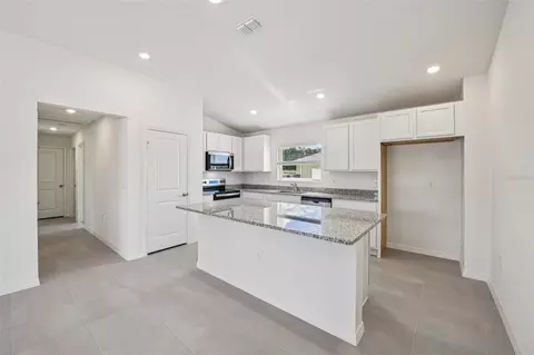Kitchen - 20404 Lavender Bloom Loop, Mount Dora, FL 32757 photo 2 of 3