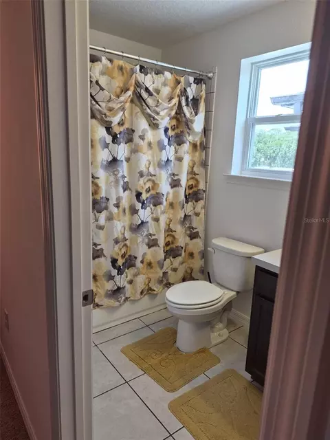 Bath - 1490 Flatwood St, Saint Cloud, FL 34771 photo 3 of 5