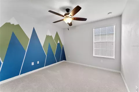 Bedroom - 3426 Schoolhouse Rd, Harmony, FL 34773 photo 8 of 11