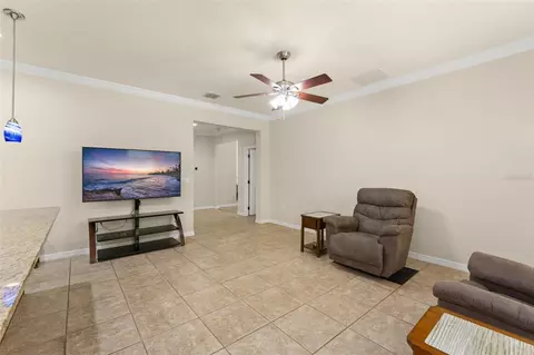 Living - 4034 Creswick Cir, Orlando, FL 32829 photo 4 of 5