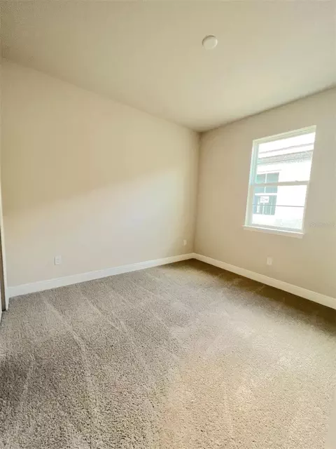Bedroom - 4961 Rain Shadow Dr, Saint Cloud, FL 34772 photo 2 of 3