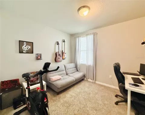 Bedroom - 572 Sun Warbler Way, Saint Cloud, FL 34771 photo 4 of 5