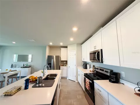 Kitchen - 572 Sun Warbler Way, Saint Cloud, FL 34771 photo 3 of 3
