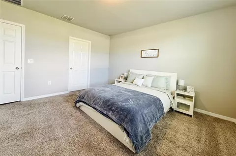 Bedroom - 572 Sun Warbler Way, Saint Cloud, FL 34771 photo 2 of 5