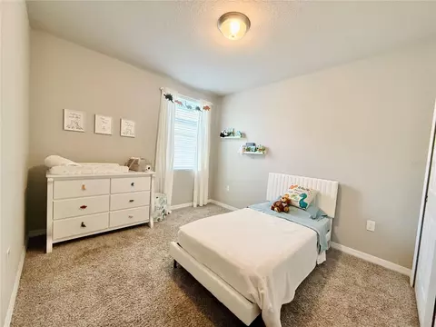 Bedroom - 572 Sun Warbler Way, Saint Cloud, FL 34771 photo 3 of 5
