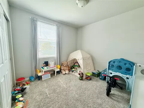 Bedroom - 572 Sun Warbler Way, Saint Cloud, FL 34771 photo 5 of 5