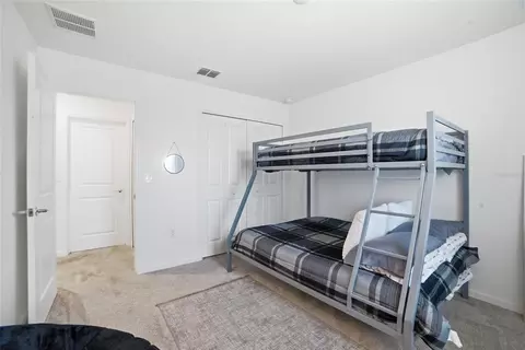 Bedroom - 4980 Four Strand Ct, Saint Cloud, FL 34772 photo 7 of 11