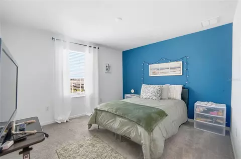 Bedroom - 4980 Four Strand Ct, Saint Cloud, FL 34772 photo 8 of 11