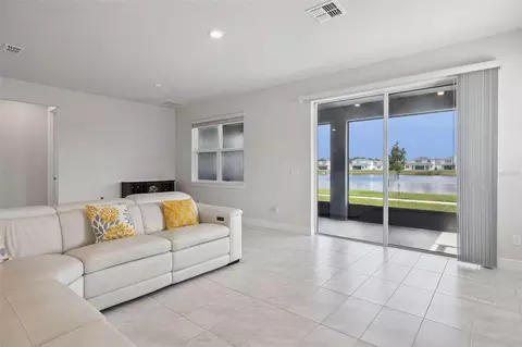 Living - 6085 Forest Perch Dr, Saint Cloud, FL 34771 photo 3 of 4