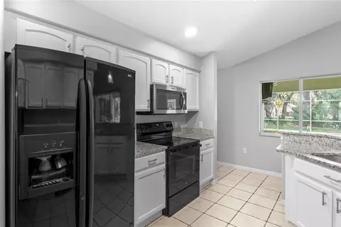 Kitchen - 4875 Calasans Ave, Saint Cloud, FL 34771 photo 3 of 5