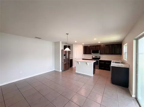 Kitchen - 4272 Moon Shadow Loop, Mulberry, FL 33860 photo 2 of 3