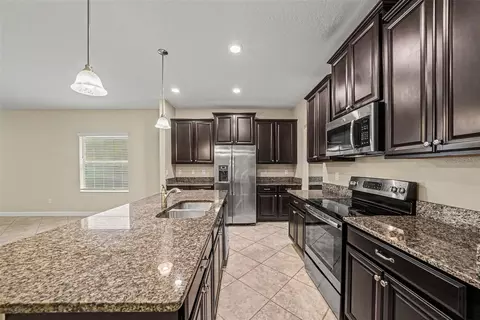 Kitchen - 11809 Twilight Darner Pl, Riverview, FL 33569 photo 1 of 2