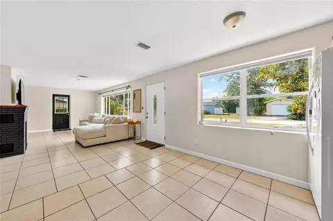Living - 71 Fairview Ave, Ormond Beach, FL 32174 photo 1 of 7