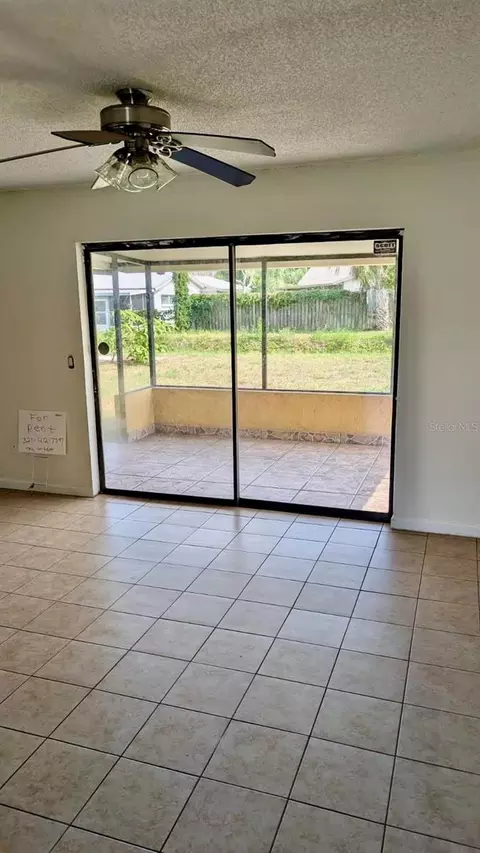 Living - 1077 Basque Dr, Rockledge, FL 32955 photo 3 of 3