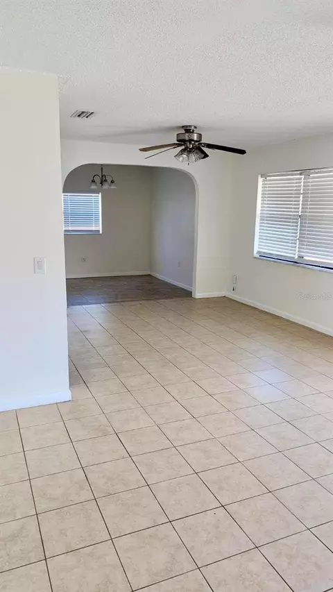 Living - 1077 Basque Dr, Rockledge, FL 32955 photo 2 of 3
