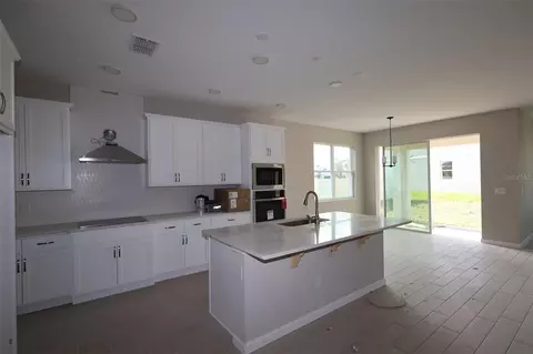Kitchen - 6693 Yellow Warbler Bnd, Saint Cloud, FL 34773 photo 1 of 1