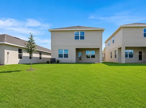Exterior - 7575 Bent Tree Loop, Harmony, FL 34773 photo 3 of 5