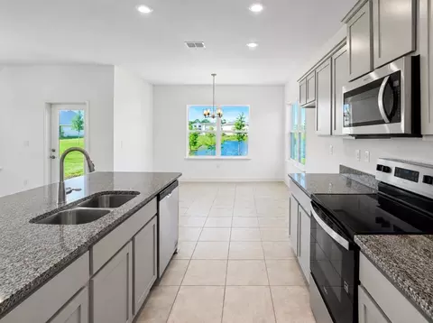 Kitchen - 7575 Bent Tree Loop, Harmony, FL 34773 photo 3 of 3