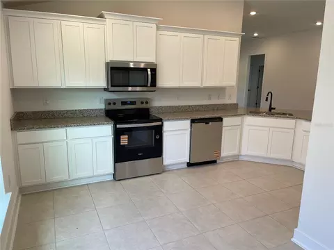 Kitchen - 7630 Bent Tree Loop, Saint Cloud, FL 34771 photo 3 of 3