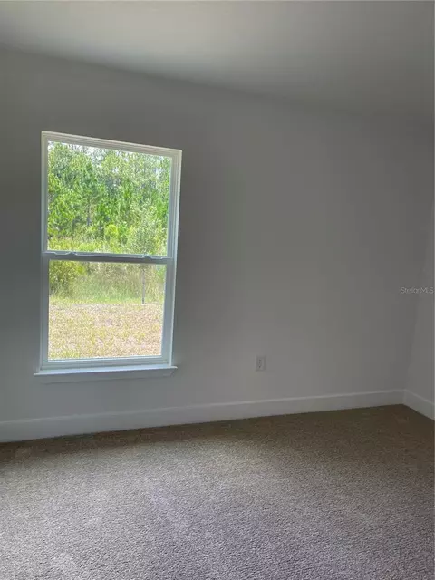 Bedroom - 7630 Bent Tree Loop, Saint Cloud, FL 34771 photo 10 of 13