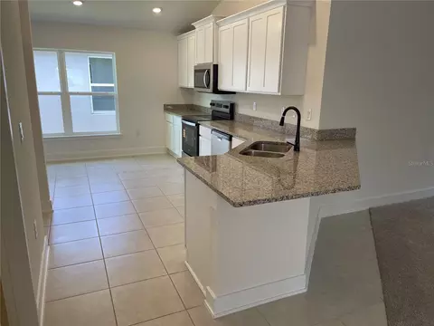 Kitchen - 7630 Bent Tree Loop, Saint Cloud, FL 34771 photo 1 of 3