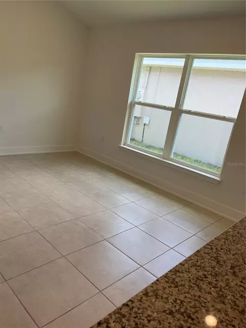 Living - 7630 Bent Tree Loop, Saint Cloud, FL 34771 photo 4 of 5
