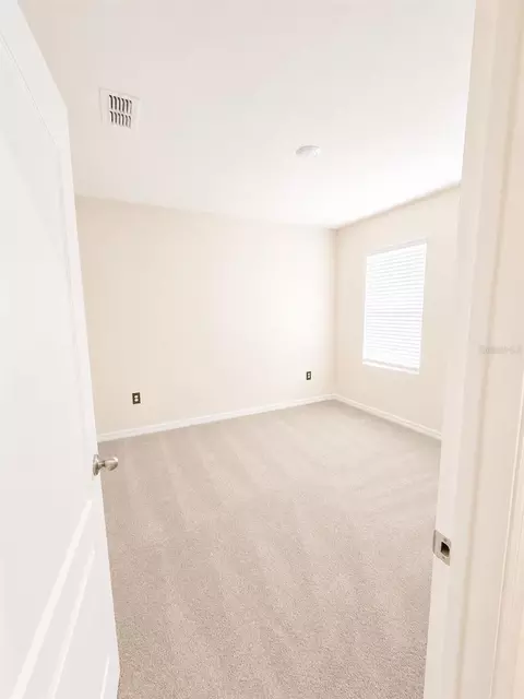 Bedroom - 2450 Taloncrest Ct, Eagle Lake, FL 33839 photo 3 of 5