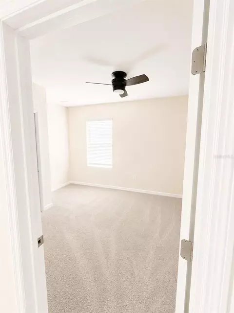 Bedroom - 2450 Taloncrest Ct, Eagle Lake, FL 33839 photo 5 of 5