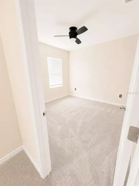 Bedroom - 2450 Taloncrest Ct, Eagle Lake, FL 33839 photo 4 of 5